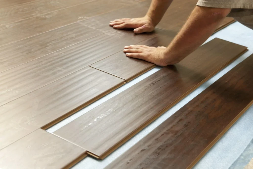 Solid wood vs engineered wood flooring showing natural timber and layered construction